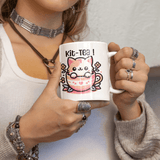 a woman holding a coffee mug with a cat on it